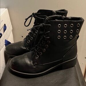 Stylish Black Combat Boots with Silver Eyelets